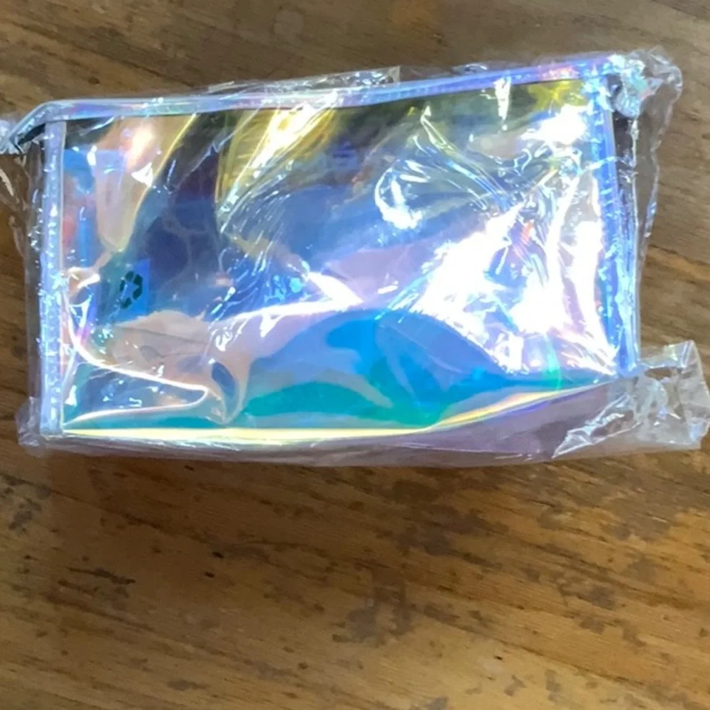 New The Crème Shop x BT21 iridescent holographic makeup bag